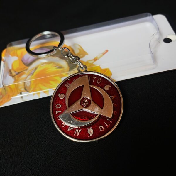 Kakashi Hatake Mangekyou Red Eye of Sharingan Rotating Keychain Keyring || NARUTO - Image 1
